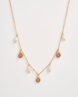 Sea Snail Charm & Pearl Worn Gold Necklace